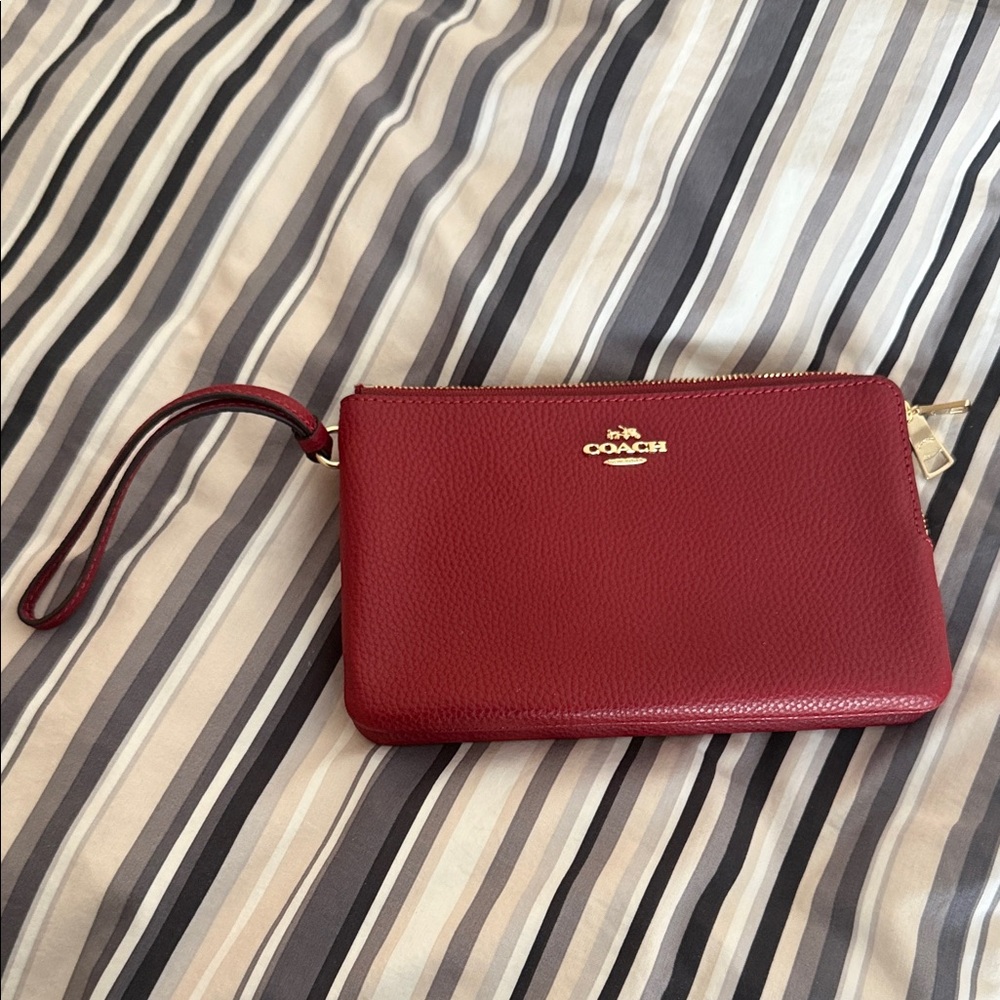 Coach Cherry Red Wristlet Clutch with 6 card holder slots, and a slot for bills.